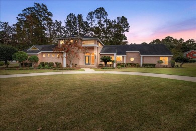 Architect's personal home with one-of-a-kind details that on Golden Eagle Country Club in Florida - for sale on GolfHomes.com, golf home, golf lot