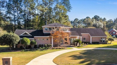 Architect's personal home with one-of-a-kind details that on Golden Eagle Country Club in Florida - for sale on GolfHomes.com, golf home, golf lot