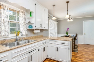 Move in ready home with updated flooring, spacious floor plan & on Arrowhead Country Club in Alabama - for sale on GolfHomes.com, golf home, golf lot