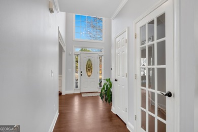 Nestled in the highly sought-after Brookstone Country Club on Brookstone Golf and Country Club in Georgia - for sale on GolfHomes.com, golf home, golf lot