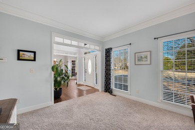 Nestled in the highly sought-after Brookstone Country Club on Brookstone Golf and Country Club in Georgia - for sale on GolfHomes.com, golf home, golf lot