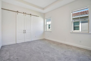 One or more photo(s) has been virtually staged. Built in 2023 on Eagle Creek Golf Club in Florida - for sale on GolfHomes.com, golf home, golf lot