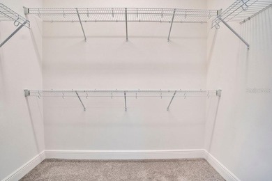 One or more photo(s) has been virtually staged. Built in 2023 on Eagle Creek Golf Club in Florida - for sale on GolfHomes.com, golf home, golf lot