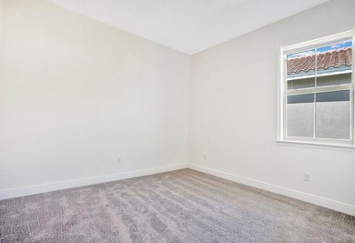 One or more photo(s) has been virtually staged. Built in 2023 on Eagle Creek Golf Club in Florida - for sale on GolfHomes.com, golf home, golf lot