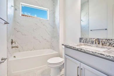 One or more photo(s) has been virtually staged. Built in 2023 on Eagle Creek Golf Club in Florida - for sale on GolfHomes.com, golf home, golf lot