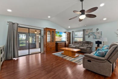 This beautiful CBS home offers the perfect blend of modern on Spanish Lakes I in Florida - for sale on GolfHomes.com, golf home, golf lot