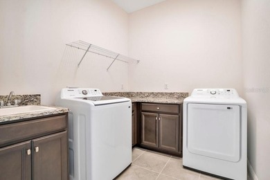 One or more photo(s) has been virtually staged. Built in 2023 on Eagle Creek Golf Club in Florida - for sale on GolfHomes.com, golf home, golf lot