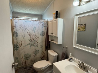 This updated 1987 home offers one bedroom, one bathroom plus a on Heather Hills Golf Course in Florida - for sale on GolfHomes.com, golf home, golf lot