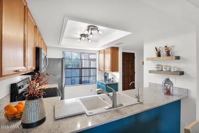 Perfectly situated on a golf course lot overlooking the 2nd tee on Fountain of the Sun Country Club in Arizona - for sale on GolfHomes.com, golf home, golf lot