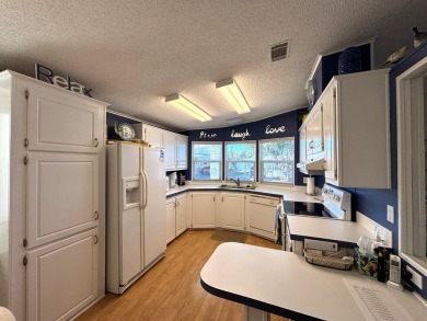 Welcome home! This 2/2 made by Jacobsen has been extremely well on Big Cypress Golf and Country Club in Florida - for sale on GolfHomes.com, golf home, golf lot