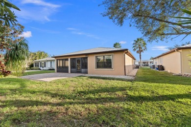 This beautiful CBS home offers the perfect blend of modern on Spanish Lakes I in Florida - for sale on GolfHomes.com, golf home, golf lot