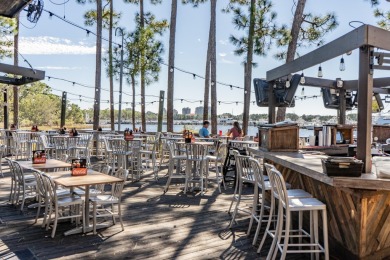 Enjoy prime Village location with front-row seats to the shows on Sandestin Golf and Beach Resort - Raven in Florida - for sale on GolfHomes.com, golf home, golf lot