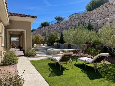 Discover this 3,904-sq-ft single-story home in a private on Southern Highlands Golf Club in Nevada - for sale on GolfHomes.com, golf home, golf lot