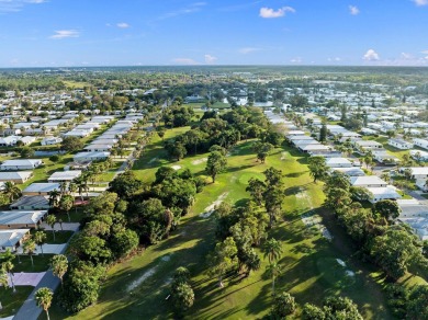 This beautiful CBS home offers the perfect blend of modern on Spanish Lakes I in Florida - for sale on GolfHomes.com, golf home, golf lot