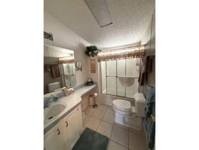 Welcome home! This 2/2 made by Jacobsen has been extremely well on Big Cypress Golf and Country Club in Florida - for sale on GolfHomes.com, golf home, golf lot