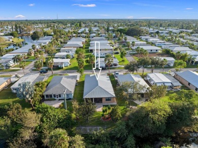 This beautiful CBS home offers the perfect blend of modern on Spanish Lakes I in Florida - for sale on GolfHomes.com, golf home, golf lot