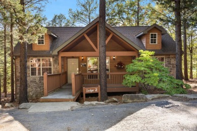 Immerse yourself in the rustic charm of this picturesque on Ledgestone Country Club and Golf Course in Missouri - for sale on GolfHomes.com, golf home, golf lot