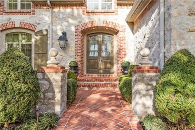 Stunning European-inspired home on Loch Lloyd's iconic 18th hole on Loch Lloyd Country Club in Missouri - for sale on GolfHomes.com, golf home, golf lot