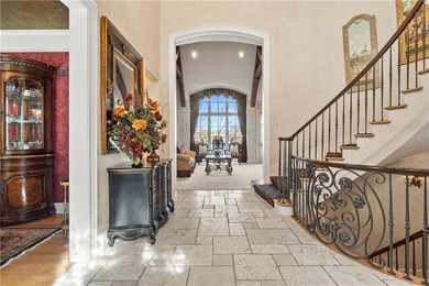 Stunning European-inspired home on Loch Lloyd's iconic 18th hole on Loch Lloyd Country Club in Missouri - for sale on GolfHomes.com, golf home, golf lot