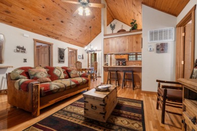 Immerse yourself in the rustic charm of this picturesque on Ledgestone Country Club and Golf Course in Missouri - for sale on GolfHomes.com, golf home, golf lot