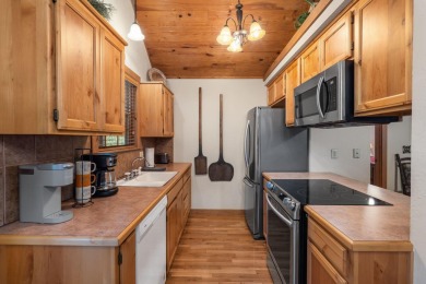 Immerse yourself in the rustic charm of this picturesque on Ledgestone Country Club and Golf Course in Missouri - for sale on GolfHomes.com, golf home, golf lot