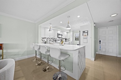 Welcome to 12926 Briarlake Dr #201 - a beautifully updated on Old Marsh Golf Club in Florida - for sale on GolfHomes.com, golf home, golf lot