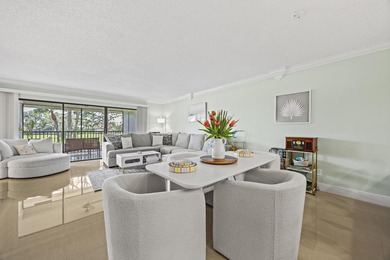 Welcome to 12926 Briarlake Dr #201 - a beautifully updated on Old Marsh Golf Club in Florida - for sale on GolfHomes.com, golf home, golf lot