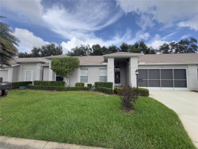 Move-in ready two-bedroom, two-bath home offering an open floor on Heritage Pines Country Club in Florida - for sale on GolfHomes.com, golf home, golf lot