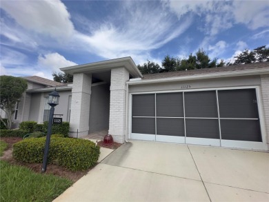 Move-in ready two-bedroom, two-bath home offering an open floor on Heritage Pines Country Club in Florida - for sale on GolfHomes.com, golf home, golf lot