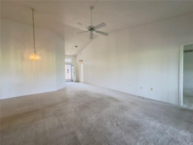 Move-in ready two-bedroom, two-bath home offering an open floor on Heritage Pines Country Club in Florida - for sale on GolfHomes.com, golf home, golf lot