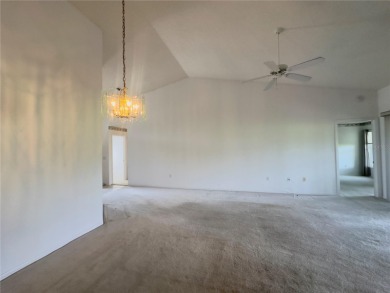 Move-in ready two-bedroom, two-bath home offering an open floor on Heritage Pines Country Club in Florida - for sale on GolfHomes.com, golf home, golf lot