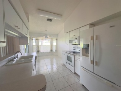 Move-in ready two-bedroom, two-bath home offering an open floor on Heritage Pines Country Club in Florida - for sale on GolfHomes.com, golf home, golf lot