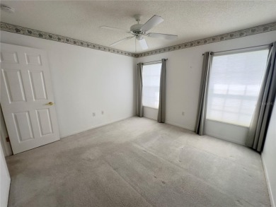 Move-in ready two-bedroom, two-bath home offering an open floor on Heritage Pines Country Club in Florida - for sale on GolfHomes.com, golf home, golf lot