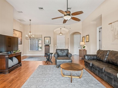 Welcome home! 8 ft doors, arched doorways, rounded corners, and on Harbor Hills Country Club in Florida - for sale on GolfHomes.com, golf home, golf lot