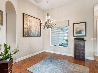 Welcome home! 8 ft doors, arched doorways, rounded corners, and on Harbor Hills Country Club in Florida - for sale on GolfHomes.com, golf home, golf lot