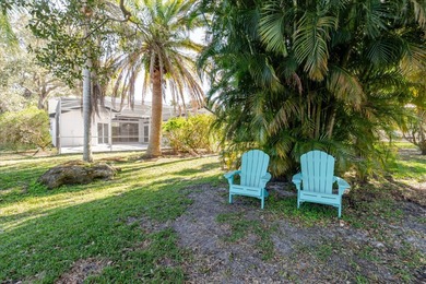 Short Sale. Step into this stunning split-floor plan residence on Tarpon Springs Golf Course in Florida - for sale on GolfHomes.com, golf home, golf lot