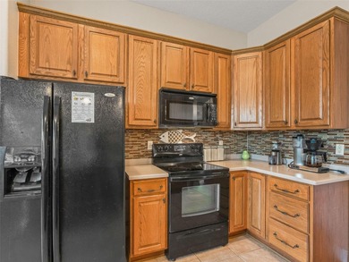 Welcome home! 8 ft doors, arched doorways, rounded corners, and on Harbor Hills Country Club in Florida - for sale on GolfHomes.com, golf home, golf lot