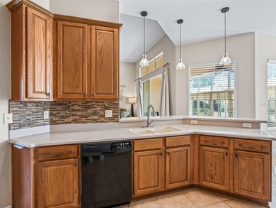 Welcome home! 8 ft doors, arched doorways, rounded corners, and on Harbor Hills Country Club in Florida - for sale on GolfHomes.com, golf home, golf lot