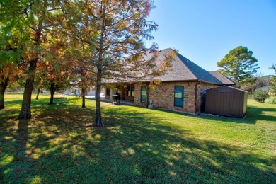 This custom brick & stone home sits on the #11 tee box and has on Lake Kiowa Golf Course in Texas - for sale on GolfHomes.com, golf home, golf lot