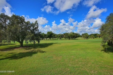 Nestled in the highly sought-after Sugar Mill Golf Townhomes on Sugar Mill Country Club in Florida - for sale on GolfHomes.com, golf home, golf lot