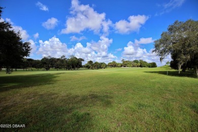 Nestled in the highly sought-after Sugar Mill Golf Townhomes on Sugar Mill Country Club in Florida - for sale on GolfHomes.com, golf home, golf lot