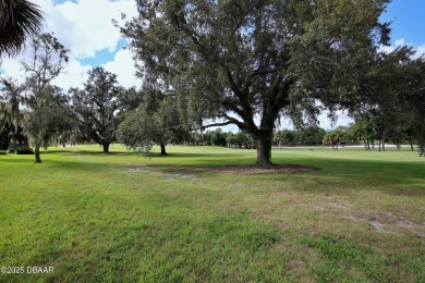 Nestled in the highly sought-after Sugar Mill Golf Townhomes on Sugar Mill Country Club in Florida - for sale on GolfHomes.com, golf home, golf lot