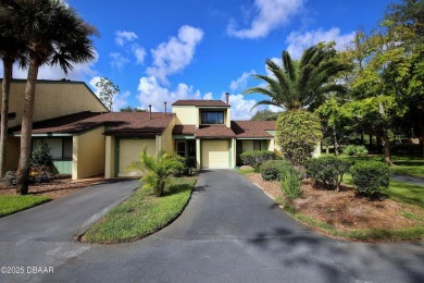 Nestled in the highly sought-after Sugar Mill Golf Townhomes on Sugar Mill Country Club in Florida - for sale on GolfHomes.com, golf home, golf lot