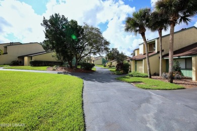 Nestled in the highly sought-after Sugar Mill Golf Townhomes on Sugar Mill Country Club in Florida - for sale on GolfHomes.com, golf home, golf lot