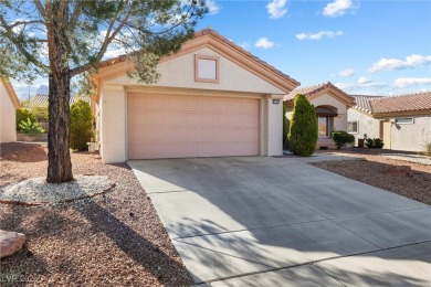 Welcome to your desert oasis in the highly sought-after Sun City on Highland Falls Golf Club in Nevada - for sale on GolfHomes.com, golf home, golf lot