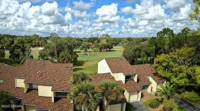 Nestled in the highly sought-after Sugar Mill Golf Townhomes on Sugar Mill Country Club in Florida - for sale on GolfHomes.com, golf home, golf lot