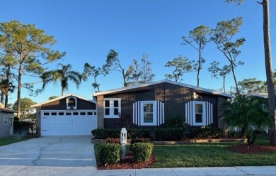 A SHOW STOPPER! Renovated 2bd/2ba home on Lake/Golf course. 1736 on Del Tura Golf and Country Club in Florida - for sale on GolfHomes.com, golf home, golf lot