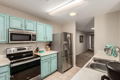 Single-story home on a premium corner lot with a pool in Johnson on The Golf Club At Johnson Ranch in Arizona - for sale on GolfHomes.com, golf home, golf lot