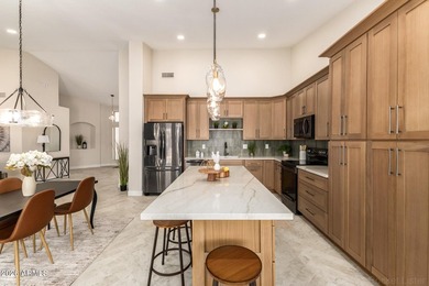 RENOVATED & TRANSFORMED Sedona model creating a 3rd bdrm on Oakwood Golf Club  in Arizona - for sale on GolfHomes.com, golf home, golf lot