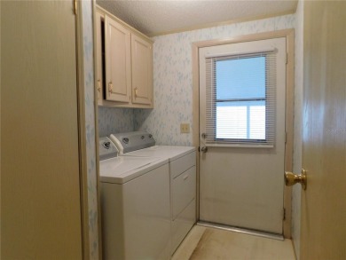 BIG PRICE DROP!!! Save money by making minor renovations on Largo Golf Course in Florida - for sale on GolfHomes.com, golf home, golf lot